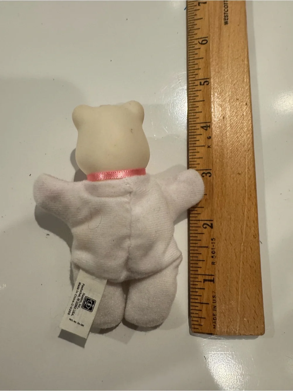 1992 Baby Cub Surprise toy by Hasbro White Bear With Pink Bow Purple Face Mini